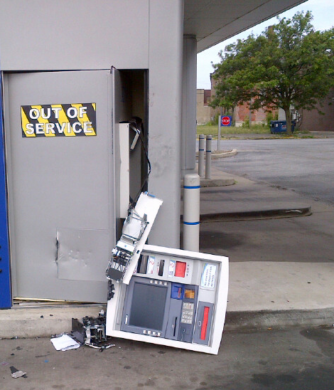 Thieves with crowbars did massive and costly damage to this ATM, but were thwarted in cracking the safe.