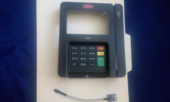 A skimmer made to be fitted to an Ingenico credit card terminal of the kind used at Walmart stores across the country. Image: Hold Security.