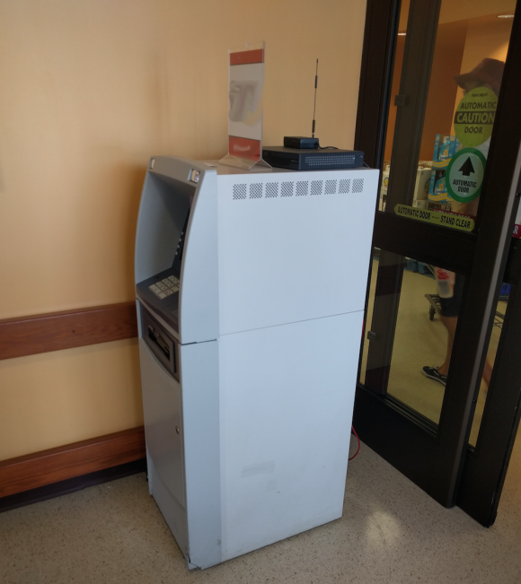 A not-very-secure ATM in front of a grocery store in Northern Virginia.