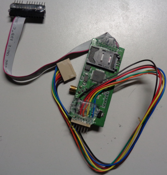 The reverse side of this GSM-based pump skimmer shows a SIM card from T-Mobile.