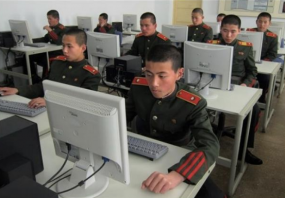 An image from HP, captioned "North Korean students training for cyberwar."