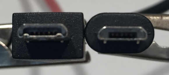 Although it's hard to tell the difference at this angle, the USB connector on the left has a set of six extra pins that enable it to read HDMI video and whatever is being viewed on the user's screen. Both cords will charge the same phone.