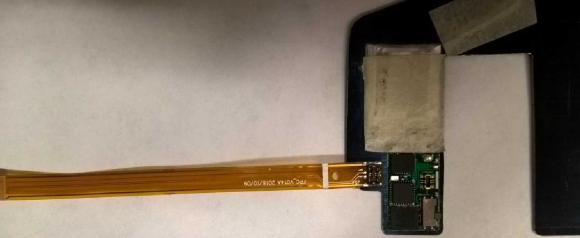 A data transfer wand inserted into a deep-insert skimmer.